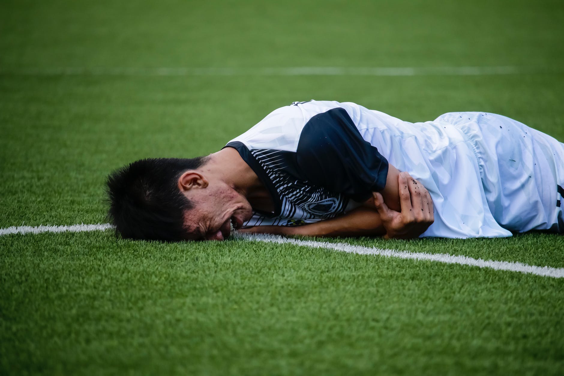 man crying on field